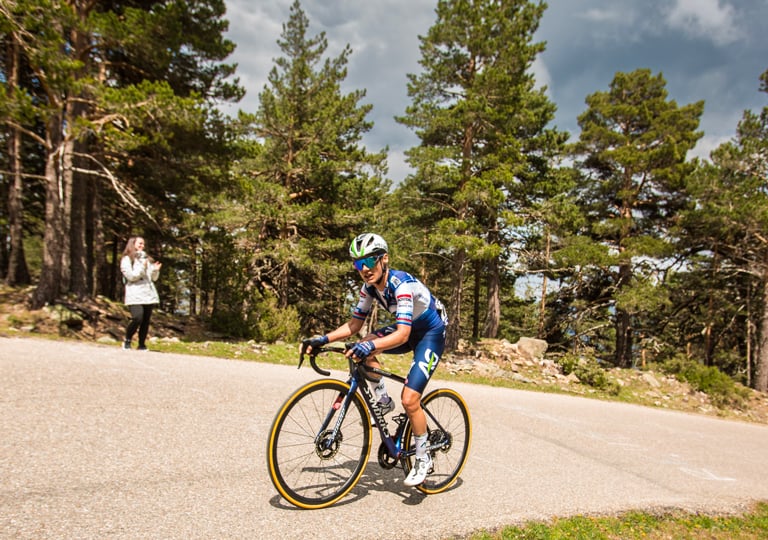 Italy's Olympic champion Paolo Bettini, left, looks at his